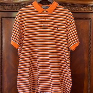 Polo by Ralph Lauren shirt is size Large. Orange with navy and white stripes.